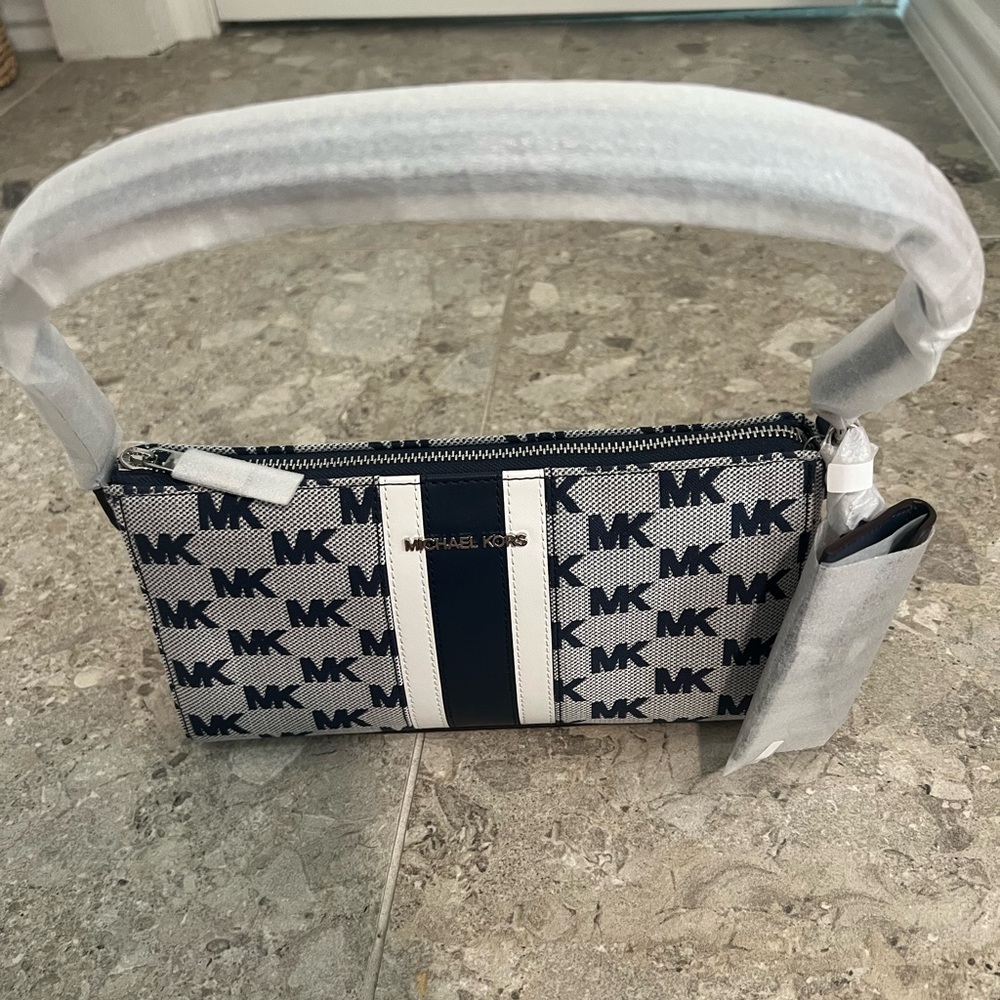 Michael Kors Vincent Navy and White Logo Jacquard Pochette Bag with card case.